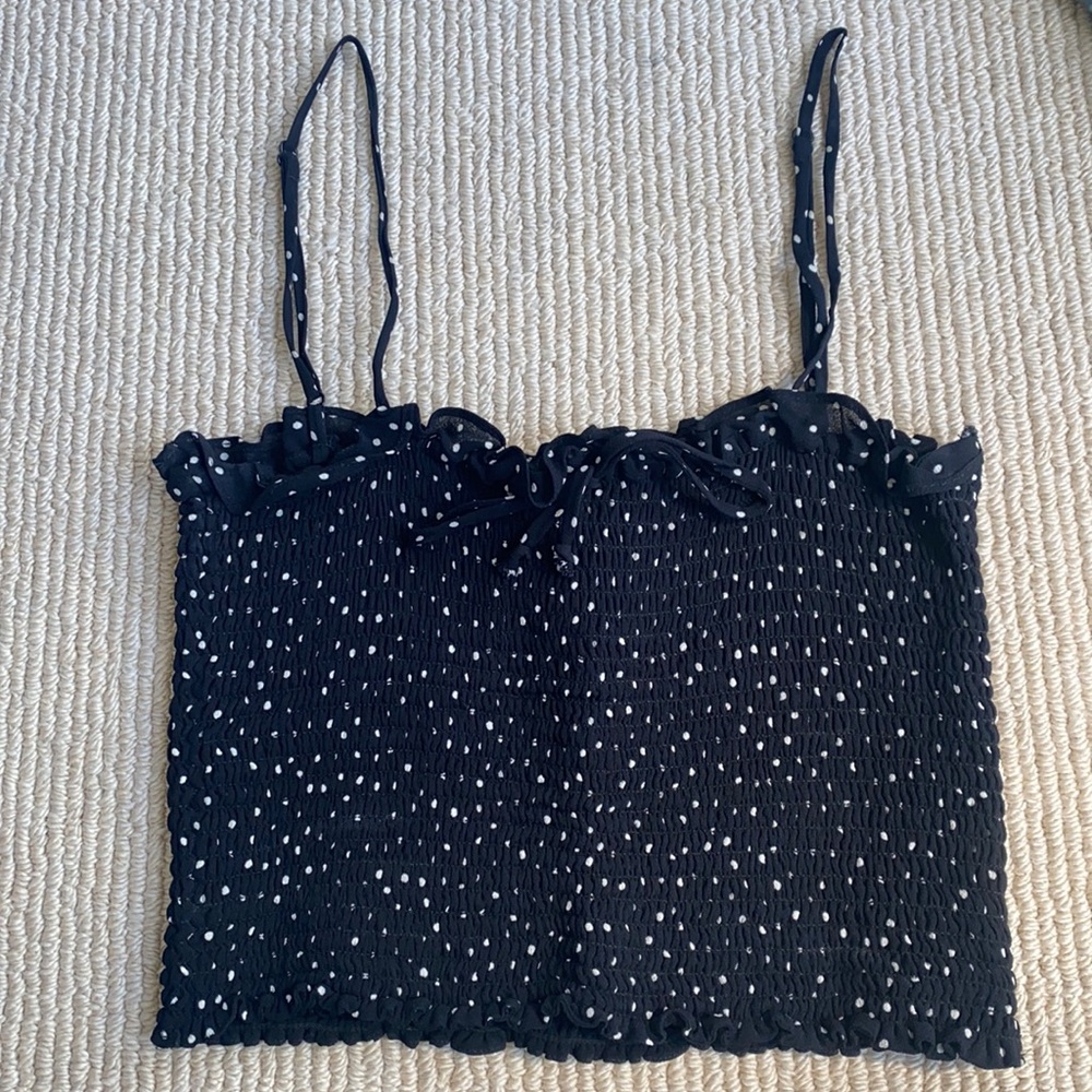 Reformation black polka dot tank top.